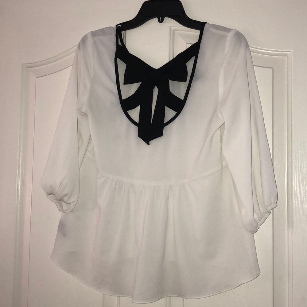 Black and white bow tie blouse